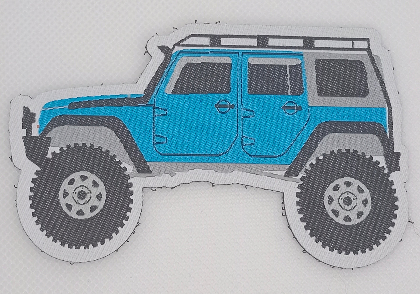 Blue Jeep Wrangler JKU - Patch